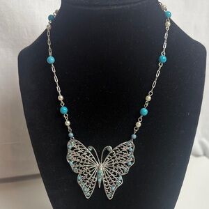 Elegant Silver Butterfly Necklace with Blue Accents